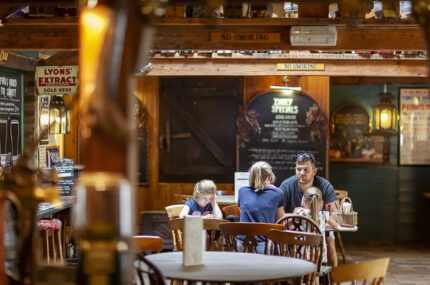 A family enjoying a meal inside the pub